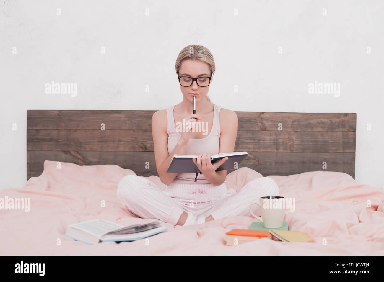 Young Woman Taking Notes Concept Stock Photo