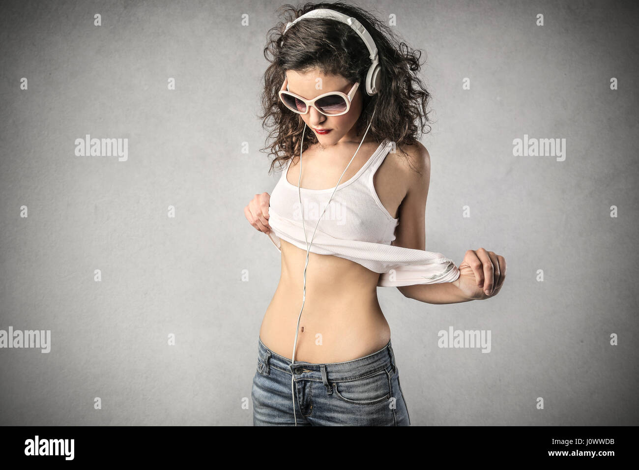 Woman Taking Shirt Off You High Resolution Stock Photography and Images Alamy