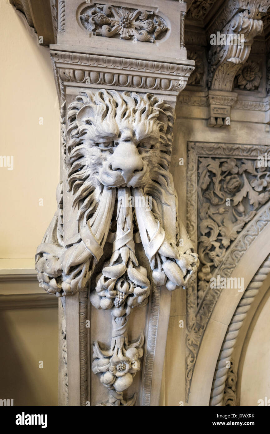 Osgoode Hall Great Library, fireplace mantle with ornate carving of a lion head, rosettes, Toronto, Ontario, Canada. Stock Photo