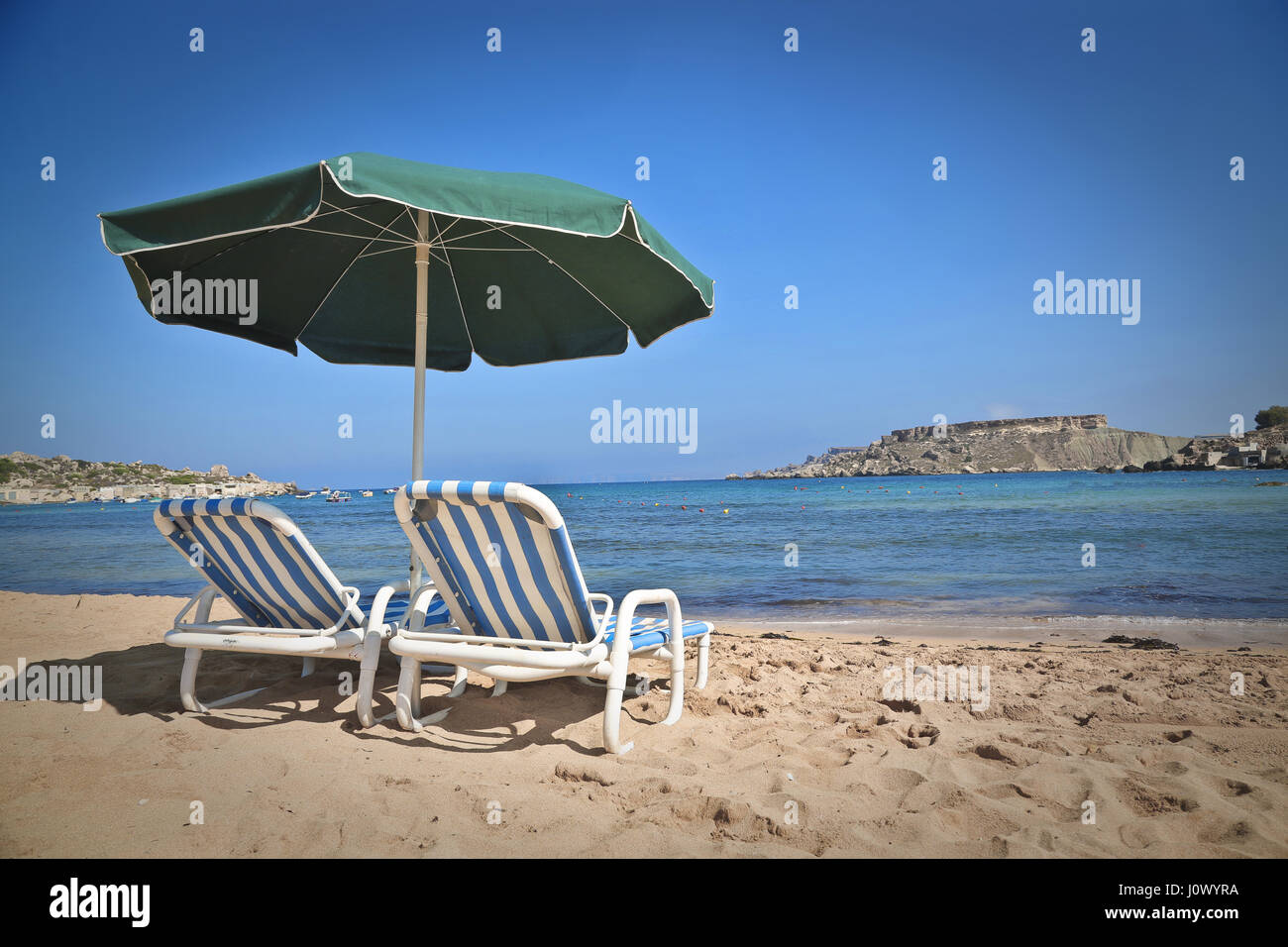 Beach chairs and sunshade on beach Stock Photo Alamy
