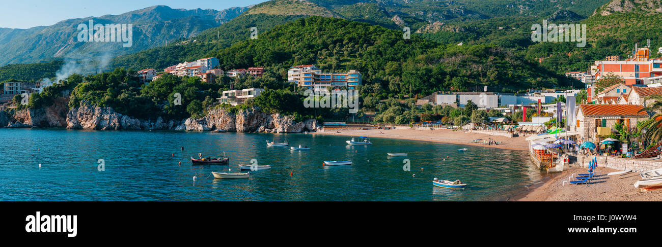 Przno, Montenegro. Beach, sun beds and umbrellas on the beach, t Stock Photo
