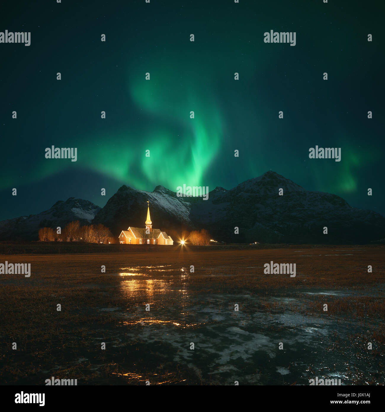 Northern Lights over church Lofoten, Nordland, Norway Stock Photo