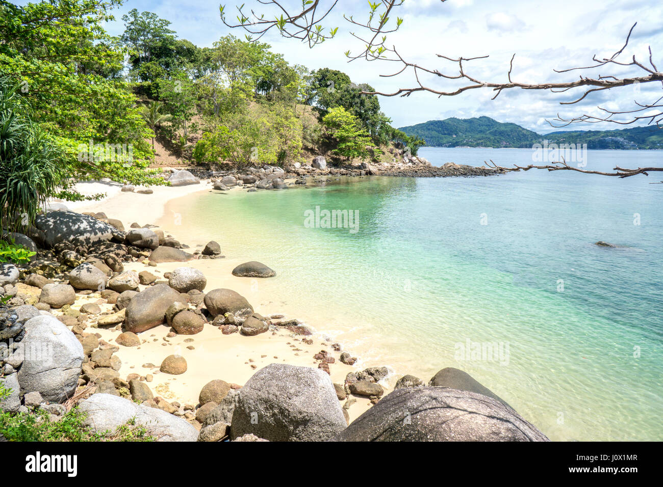 Beautiful sunny beach. View of nice tropical beach with palms trees around. Holiday and Vacation concept Stock Photo