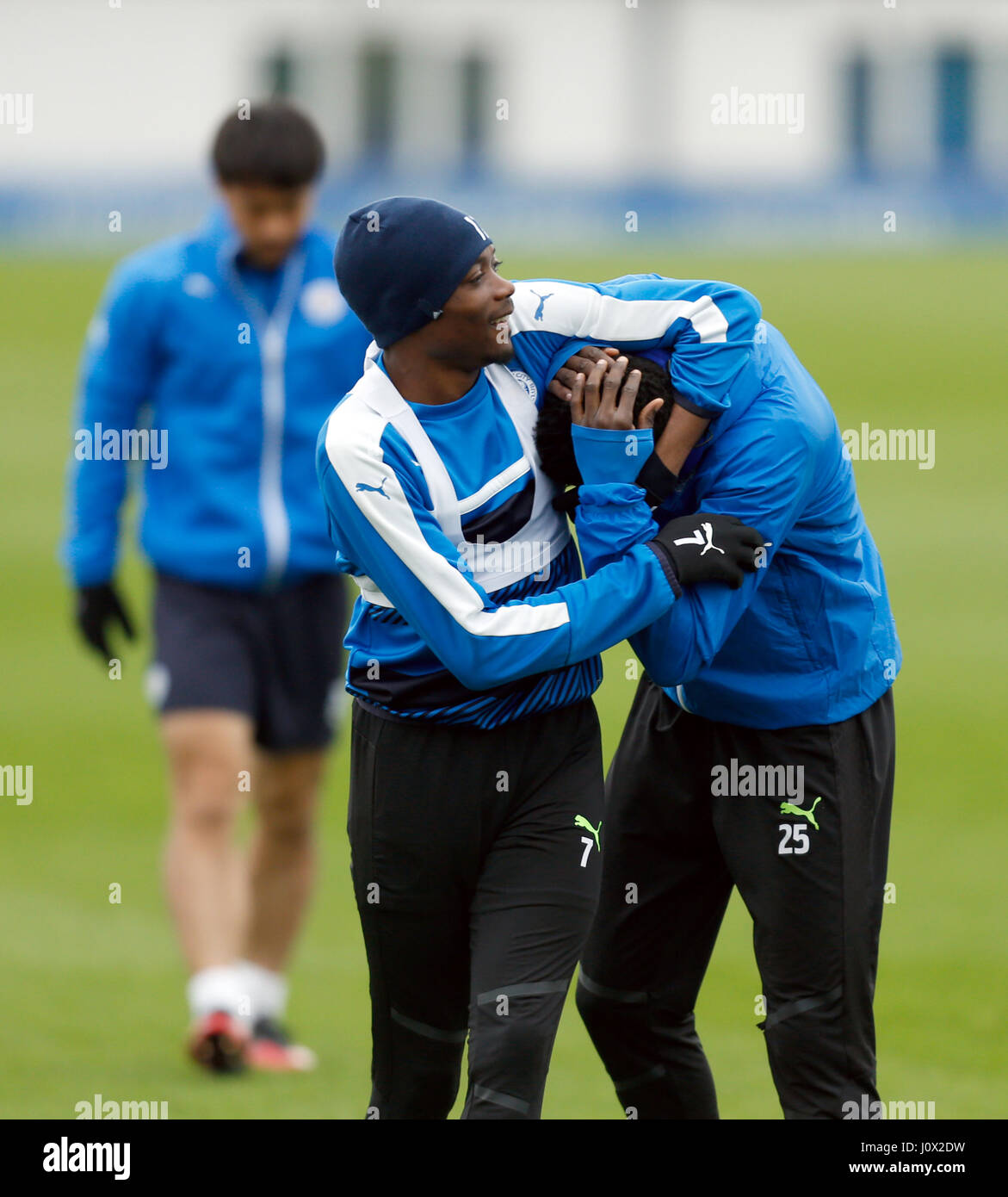 Leicester City's Ahmed Musa (left) shares a joke with Wilfred Ndidi during the training session at Belvoir Drive Training Ground, Leicester. Stock Photo
