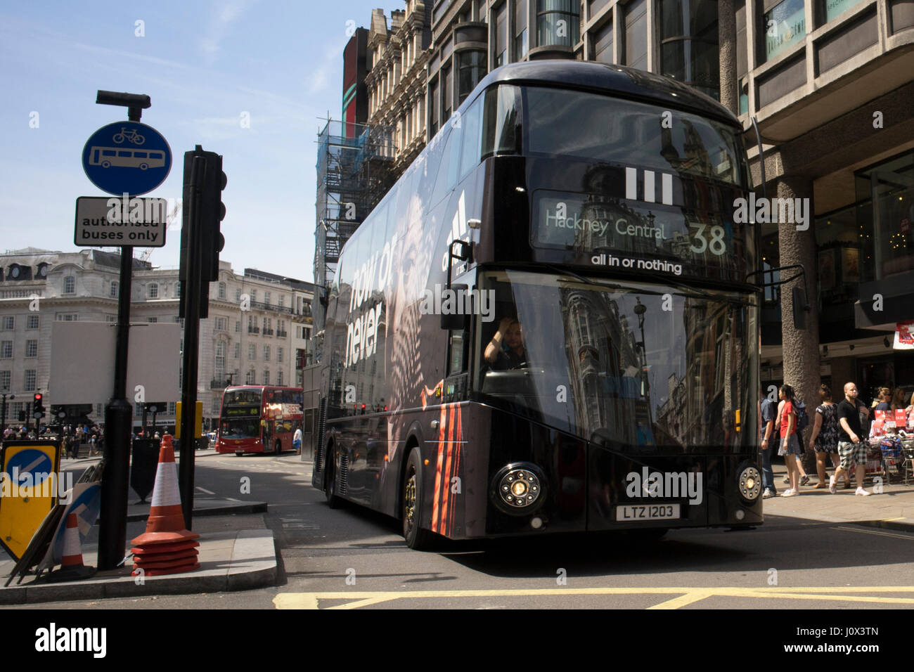 A new Routemaster bus in black livery in central London, this is a very unusual colour for a London bus Stock Photo