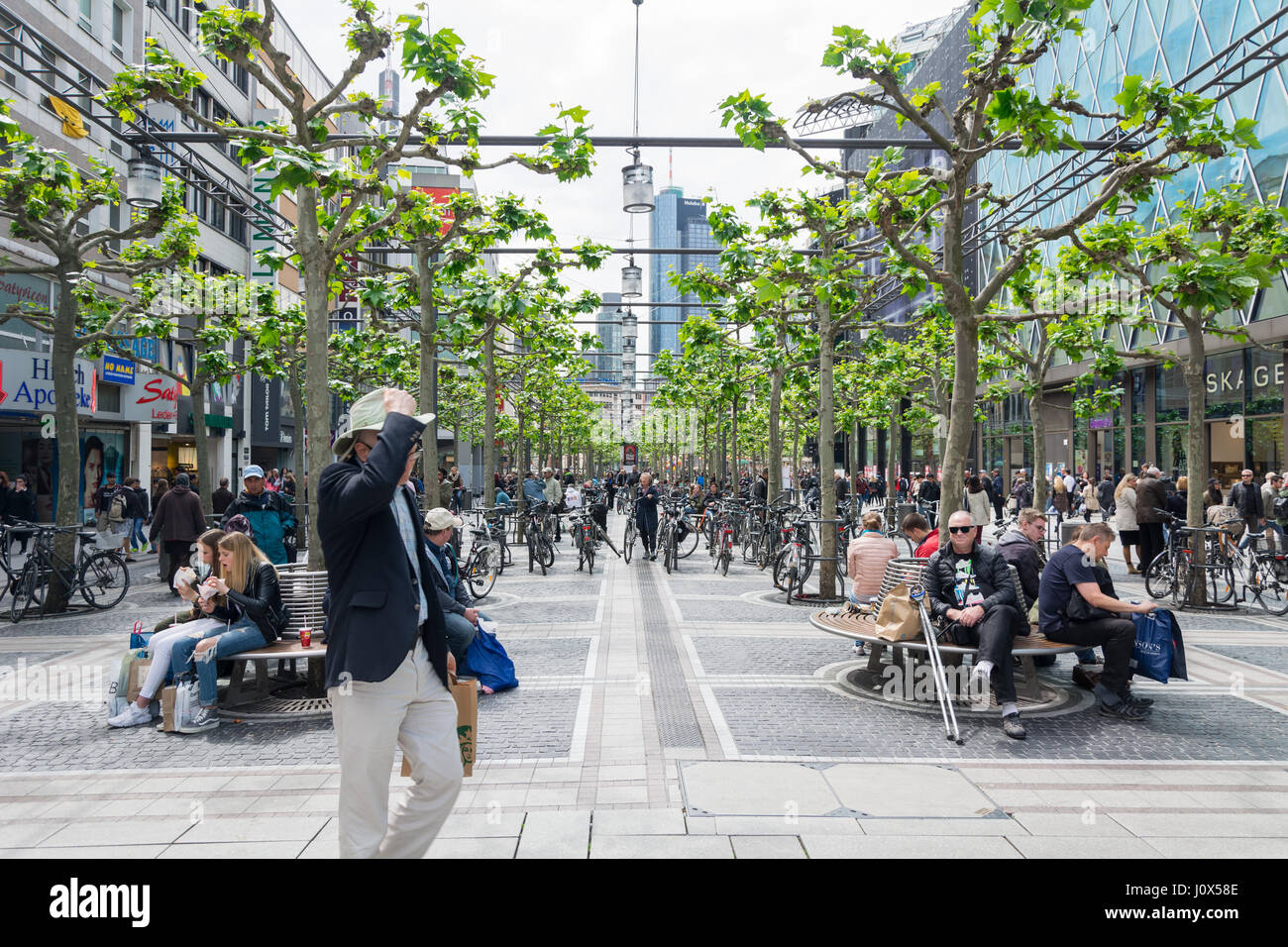 FRANKFURT AM MAIN, GERMANY - MAY 18, 2016: people walk along the Zeil in midday in Frankfurt, Germany. Since the 19th century it is of the most famous Stock Photo