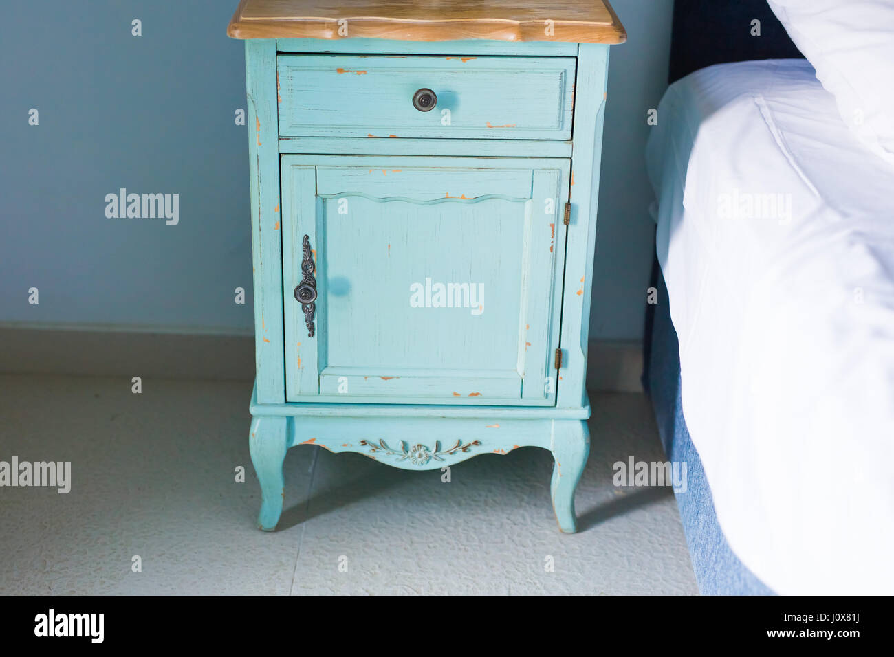 Blue stylish nightstand Stock Photo Alamy