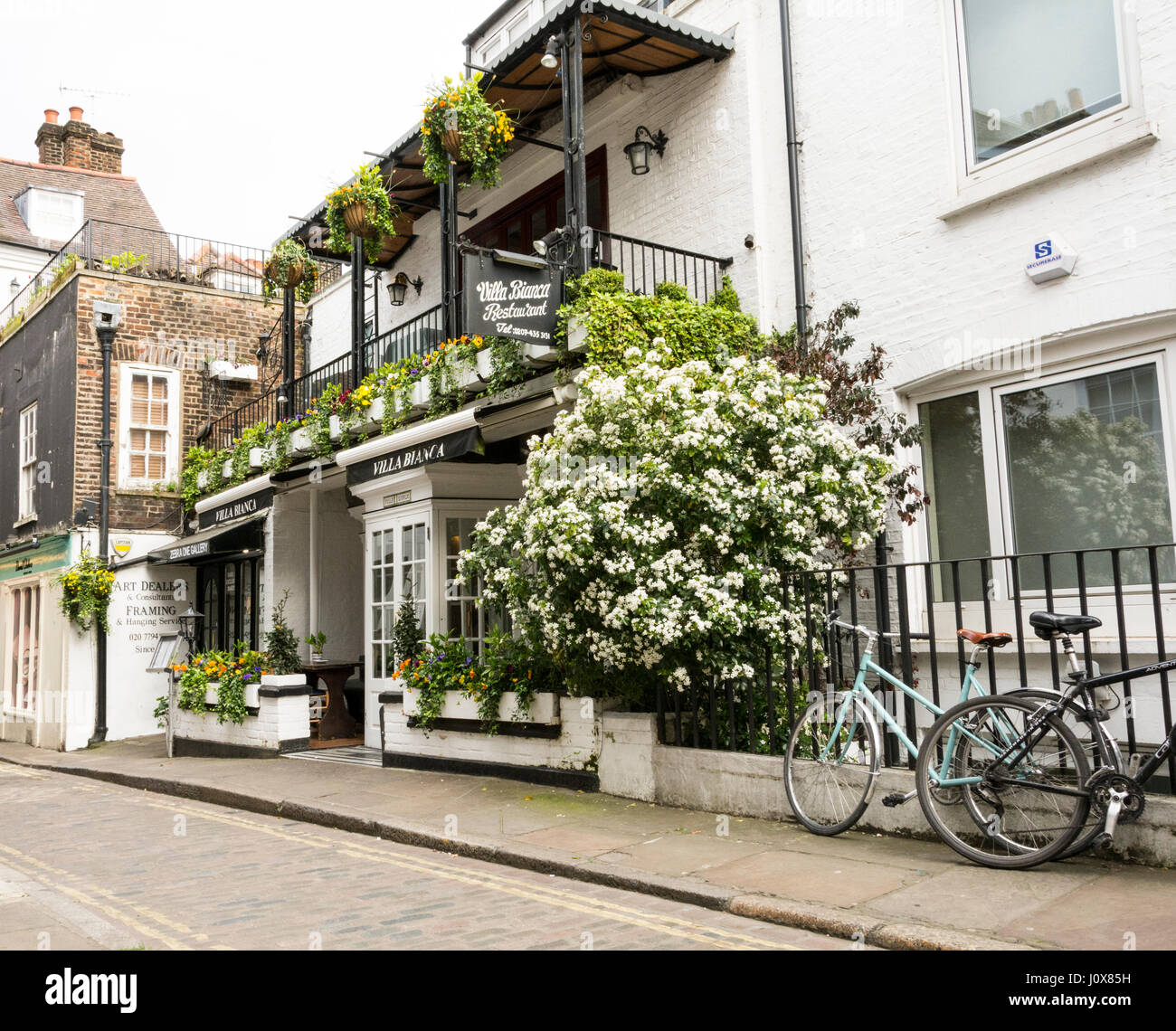 Quaint shops on Perrins Court, Hampstead, London, NW3 Stock Photo