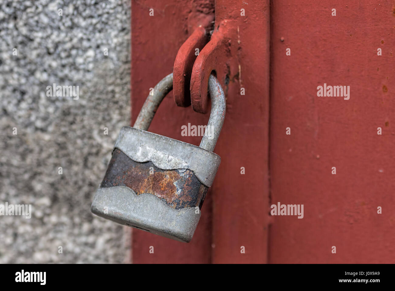 Old rusty lock on old iron gate, nostalgia image Stock Photo - Alamy