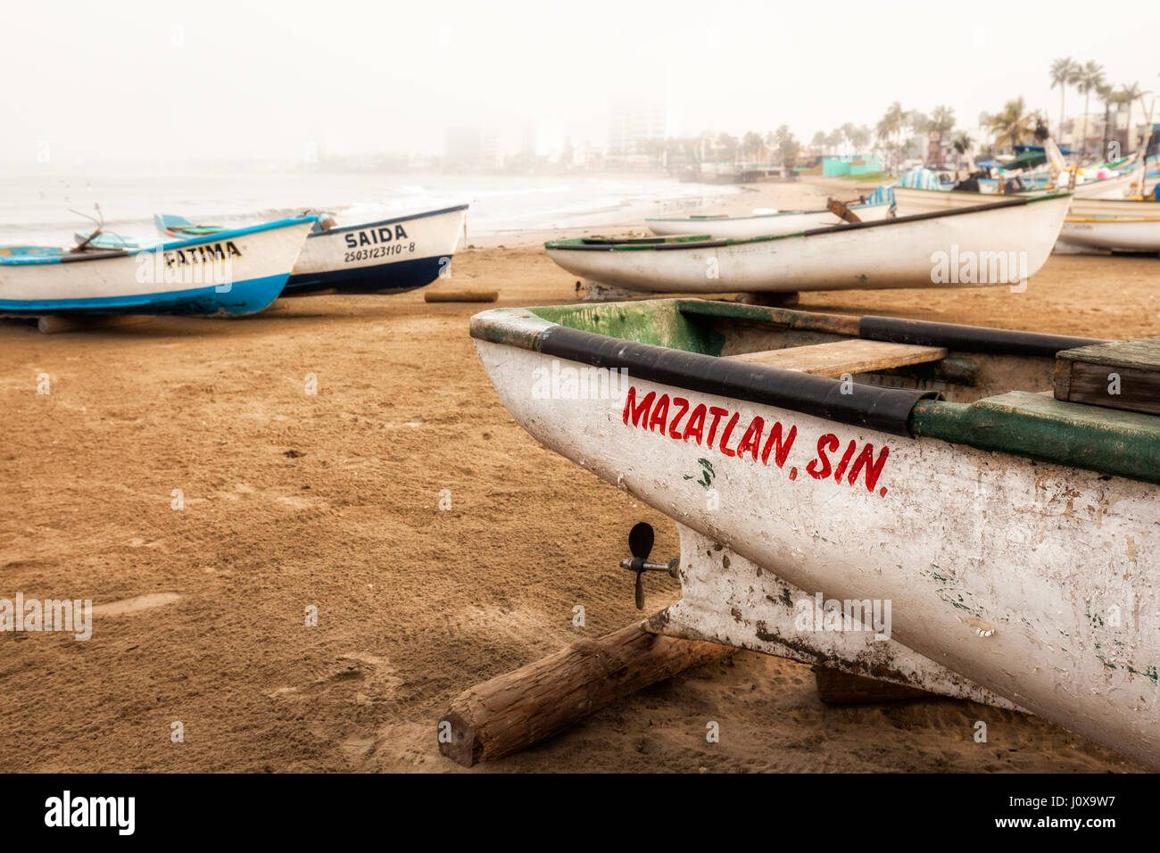 Fishing boats on the beach of Mazatlan, Sinaloa, Mexico. Stock Photo