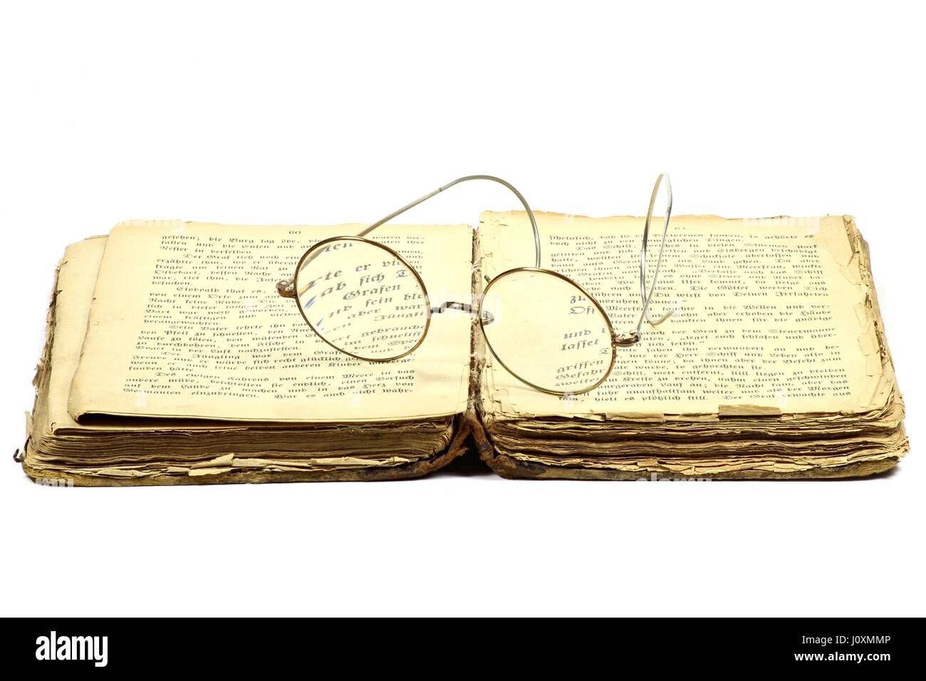 antique book with glasses isolated on white background Stock Photo