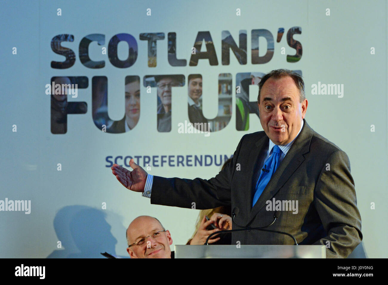 Scotland's First Minister Alex Salmond addresses a public meeting in Arbroath as Finance Secretary John Swinney looks on Stock Photo
