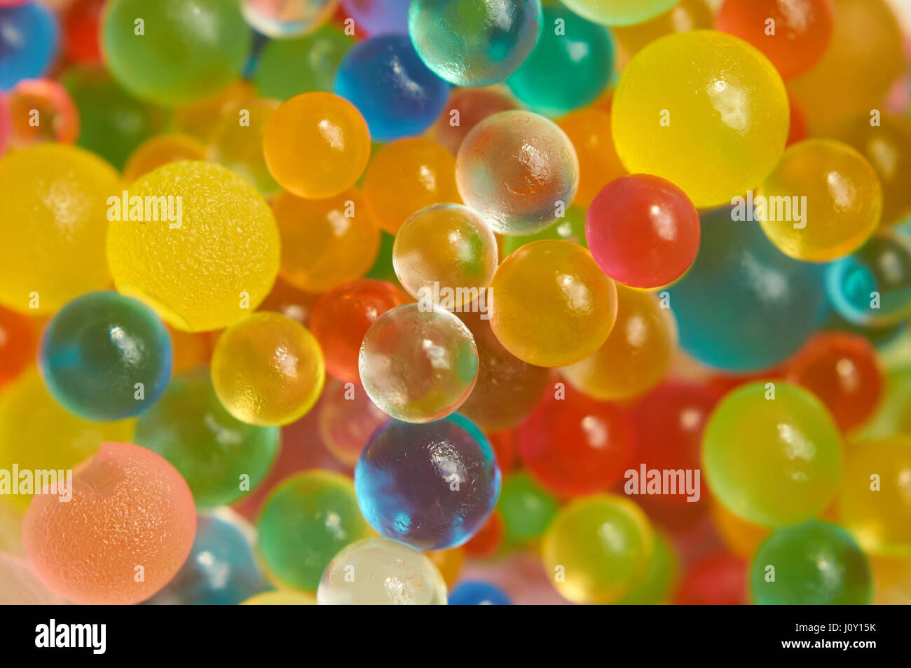 Background made with scattered color gel balls Stock Photo Alamy
