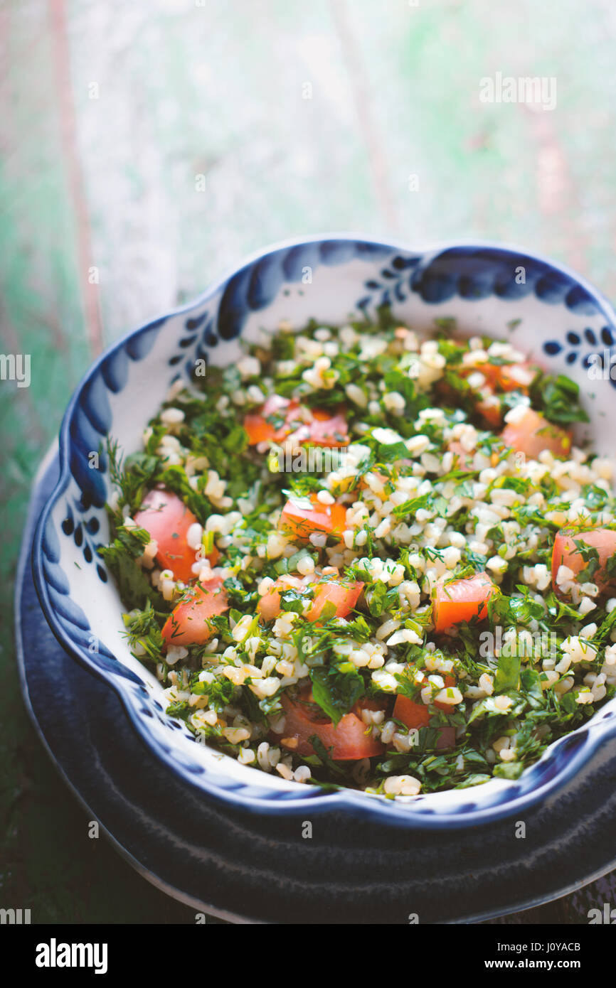Tabbouleh Salad with tomato, bulgur and parsley horizontal Stock Photo ...