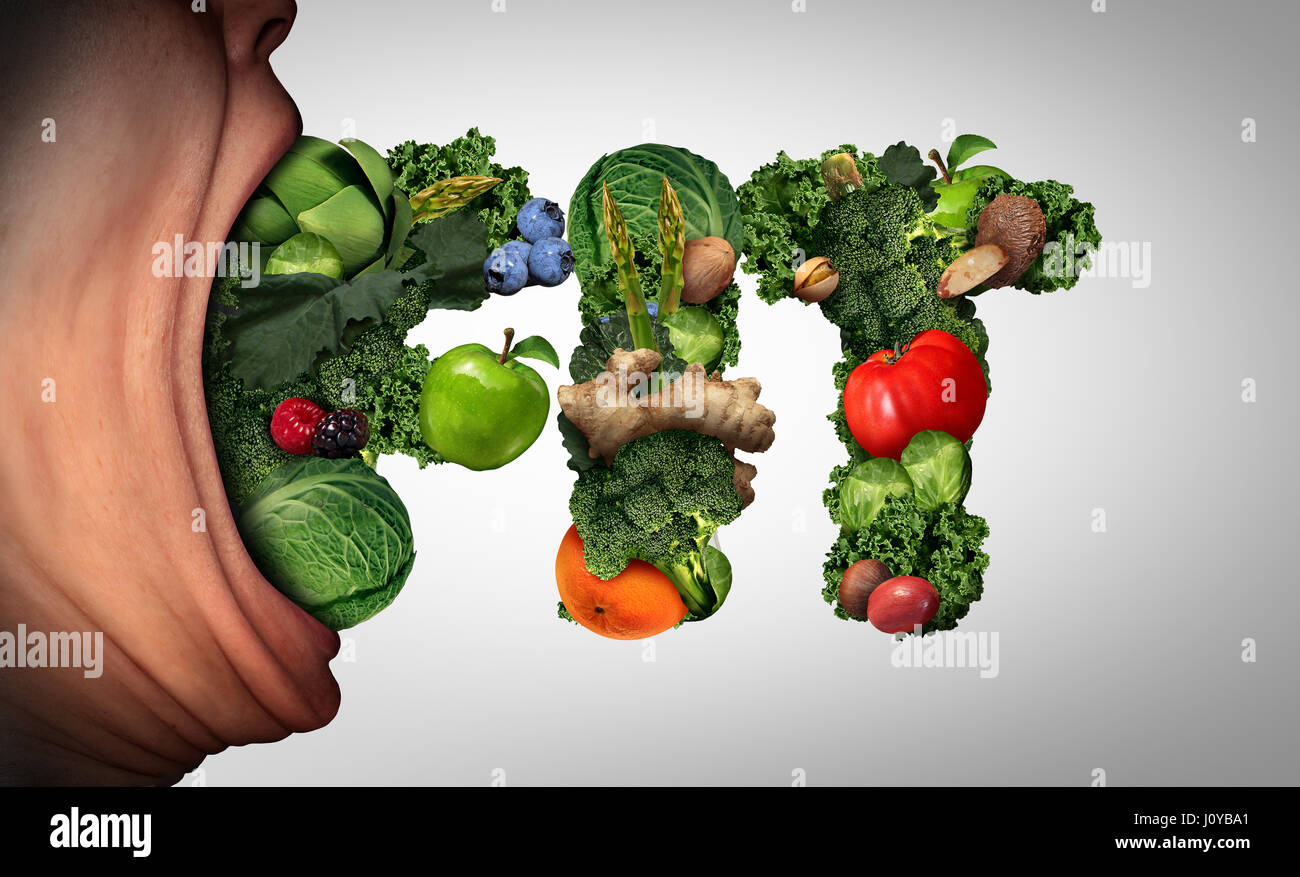 Healthy eating lifestyle concept as an open mouth biting a group of fruits and vegetables shaped as the word fit as a symbol for wellness. Stock Photo