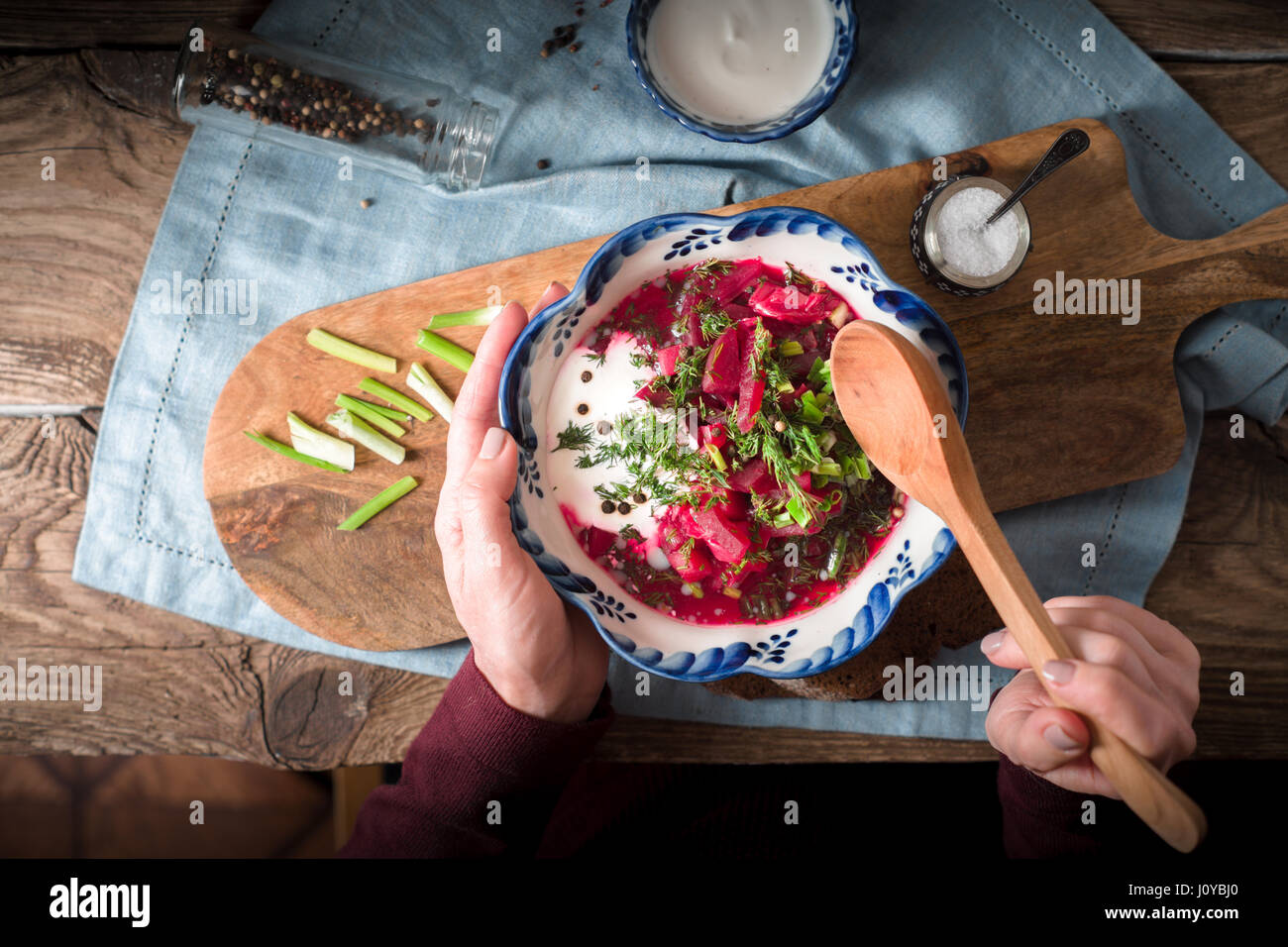 Eating borscht from ceramic plate top view Stock Photo