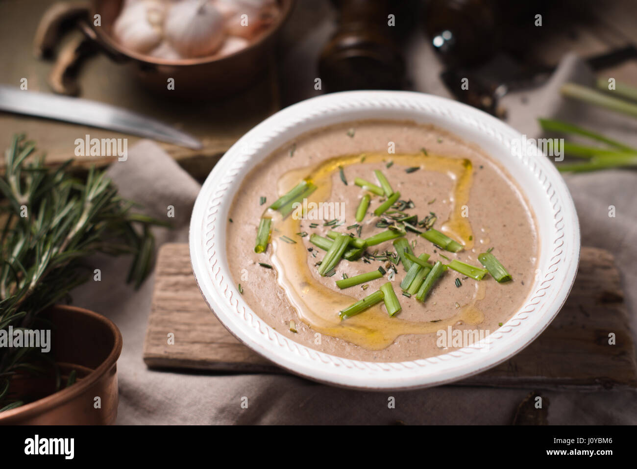 Mushroom soup puree in a ceramic bowl Stock Photo