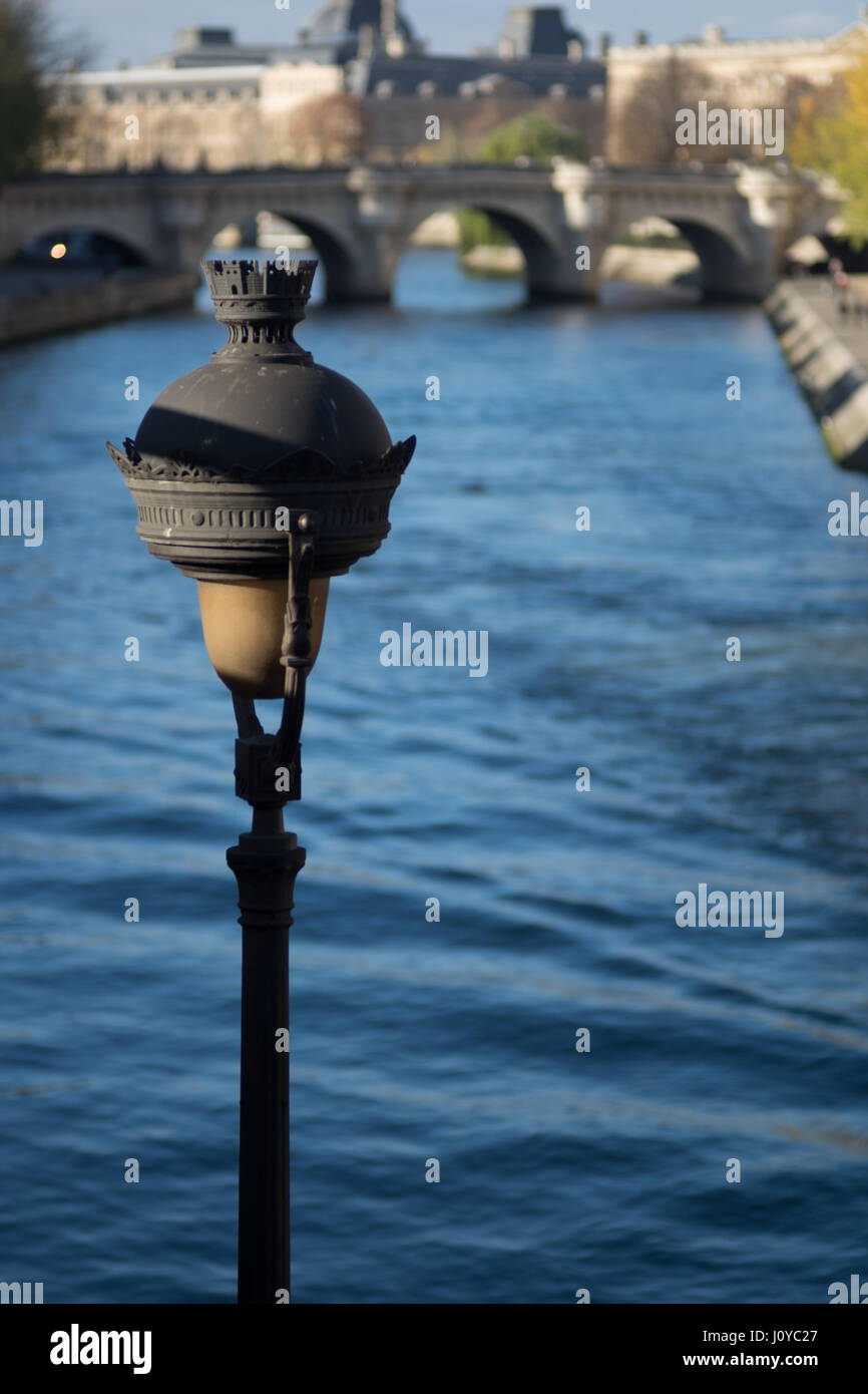 Street lantern in Paris with Seine in the background Stock Photo