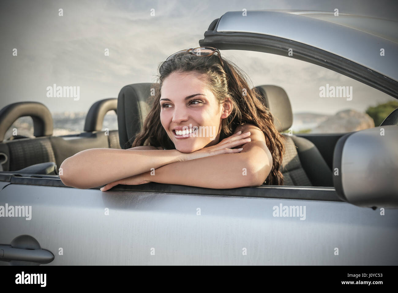 Girl laying car hires stock photography and images Alamy