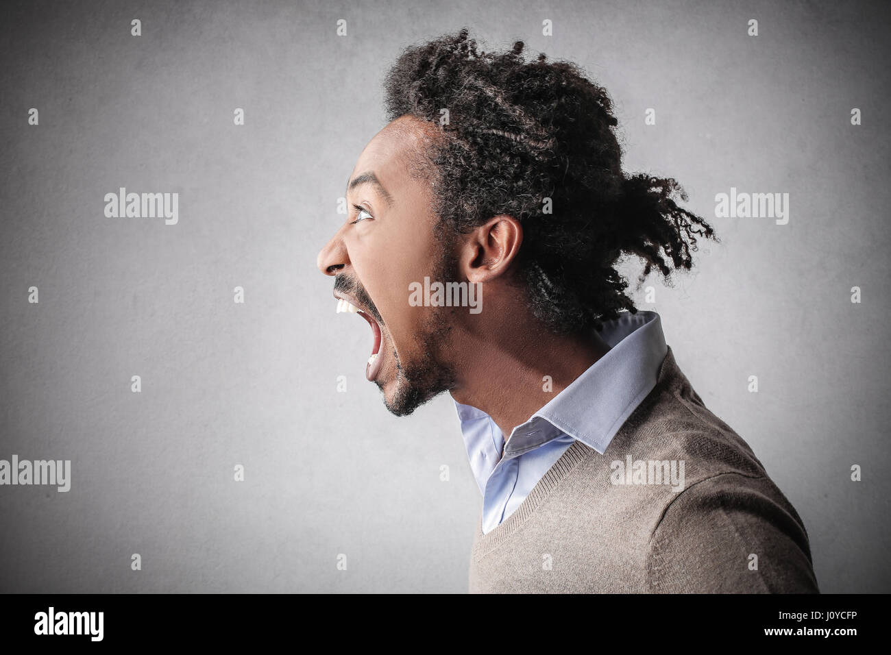 Young black man yelling Stock Photo