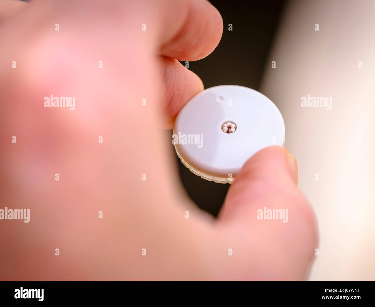 Type 1 Diabetes -  a close up of a flash glucose monitor sensor made by Abbott called the Freestyle Libre. Stock Photo