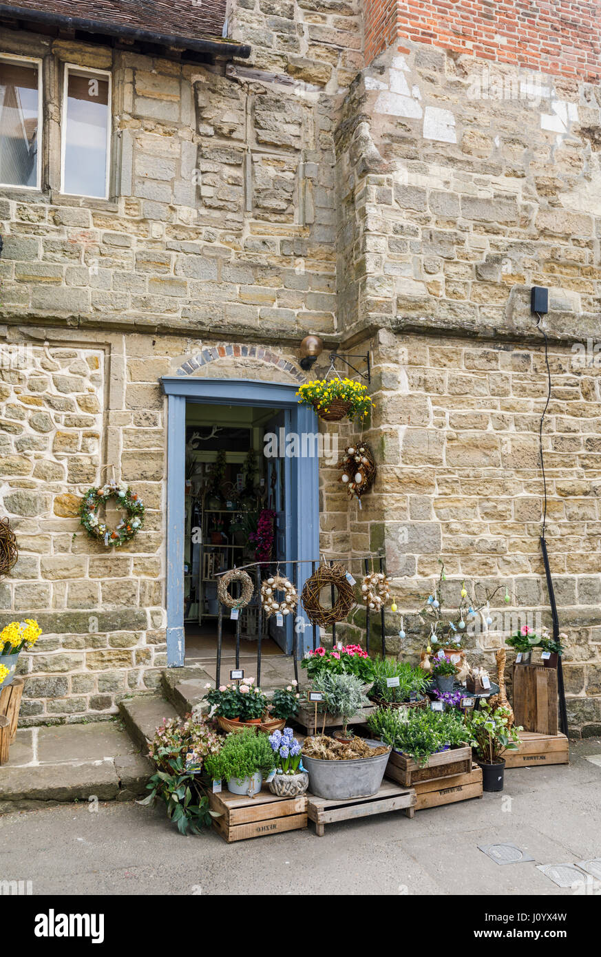 Display of plants outside a florists shop in an old building in
