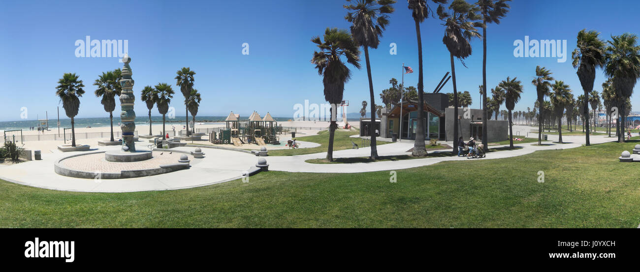 Los angeles, USA - june 2, 2011: Panorama of the venice beach promenade with people and playground in Los Angeles, California. Stock Photo