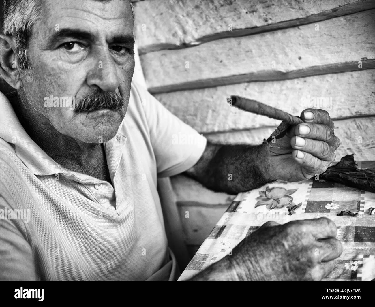 Man with self-made cigar in Viñales, Cuba Stock Photo