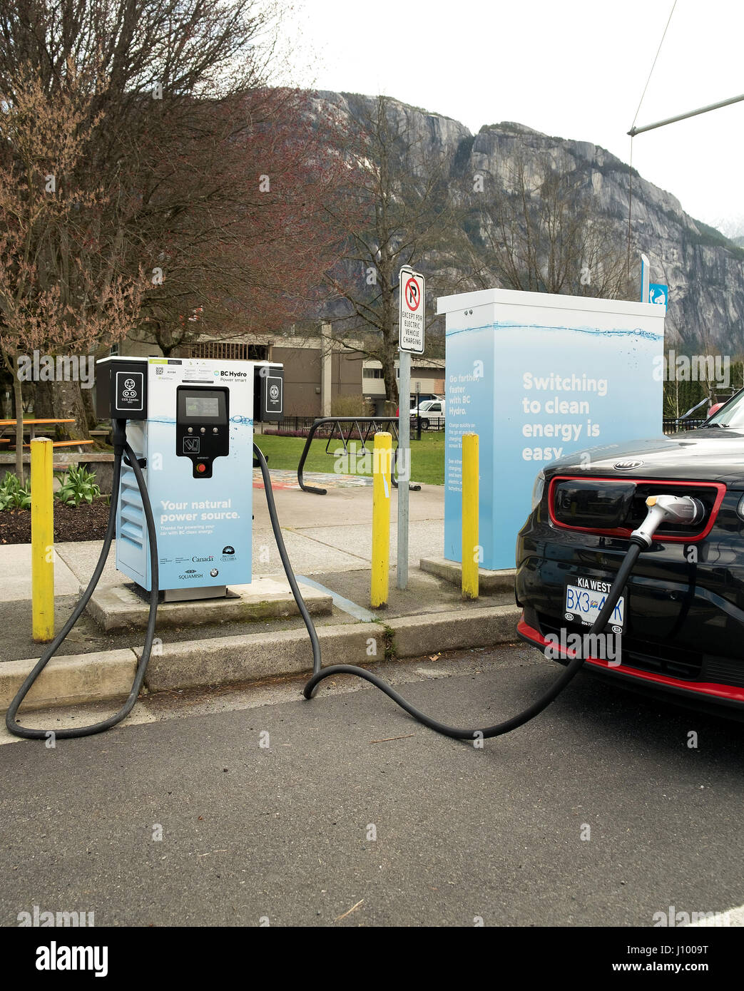 Electric car charging at the Squamish car charging station. Squamish BC