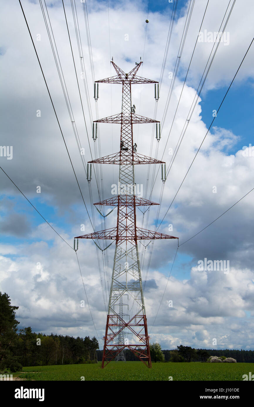 Pylon of high voltage transmission line. Cloudy sky in background Stock ...