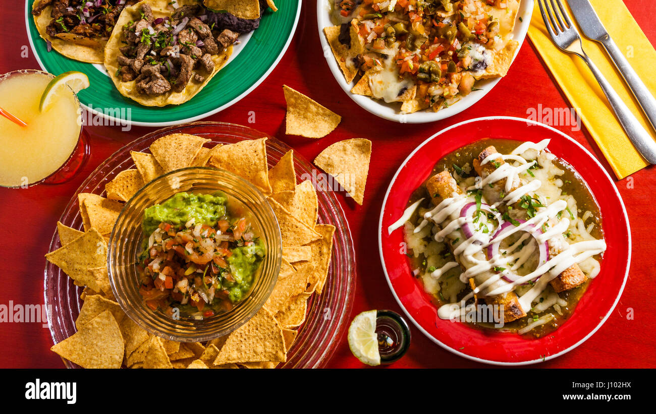 Mixed mexican food: Guacamole, nachos, fajita, meat tacos. Top view. Tex-mex  cuisine. Assorted appetizers. Cuisine of Mexico Stock Photo - Alamy