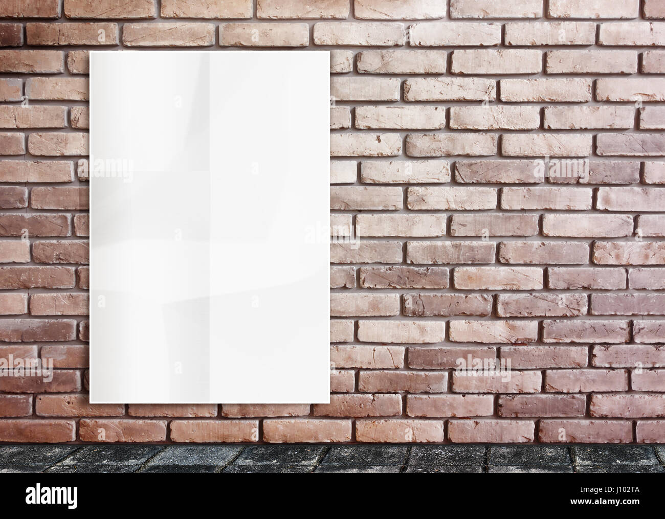 Poster hanging up brick wall hi-res stock photography and images - Alamy