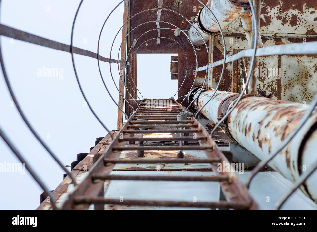 Rusty ladder on an abandoned building site Stock Photo - Alamy