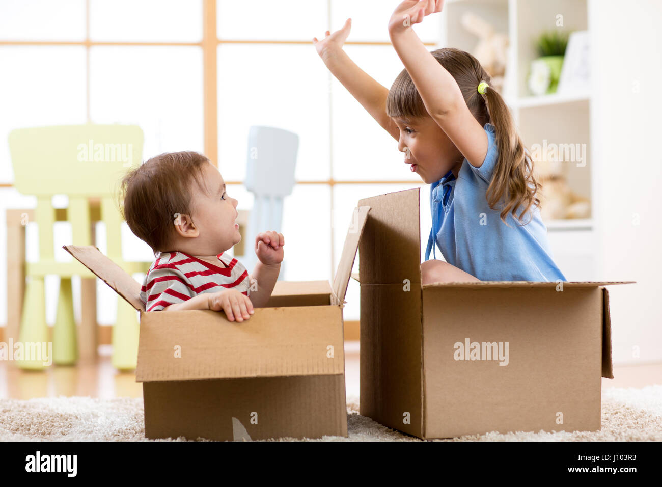 Children With Box Children playing in cardboard boxes hi-res stock photography and images ...