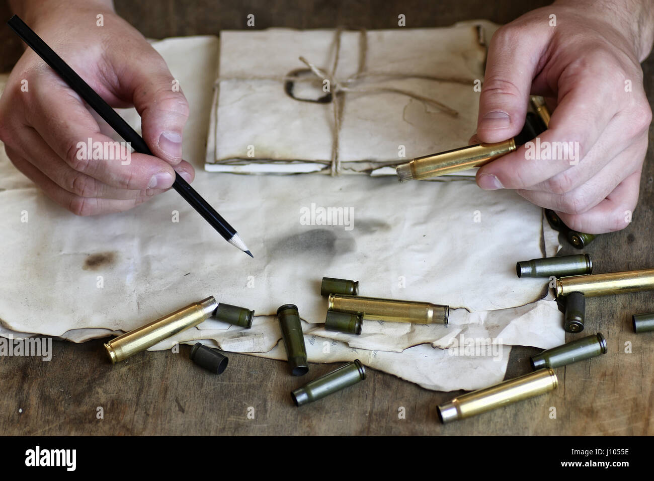 man write letter retro bullet on the table Stock Photo - Alamy