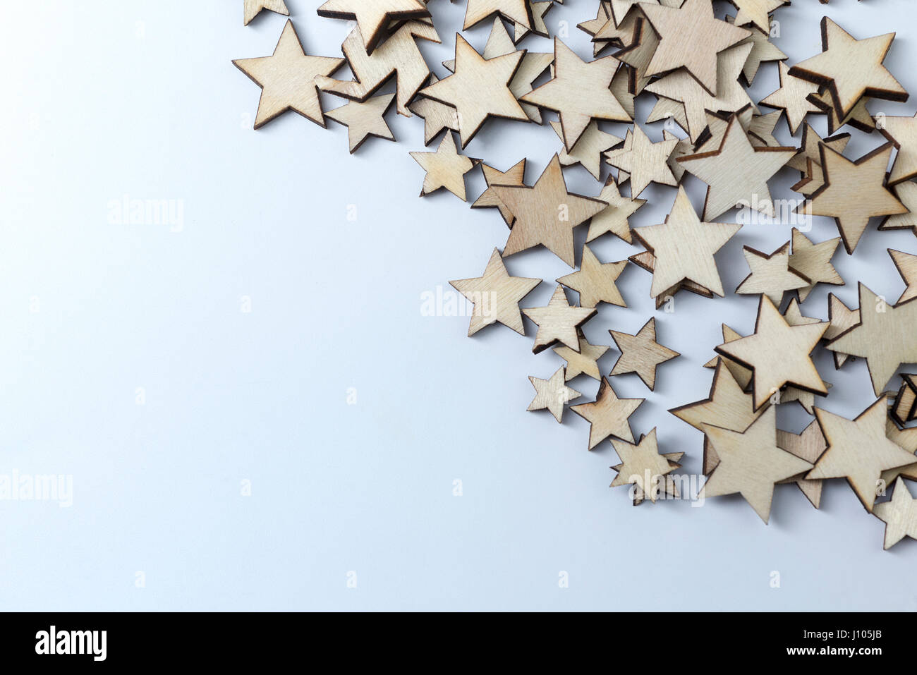 Lot Of Decorative Wooden Stars On A White Background Stock Photo