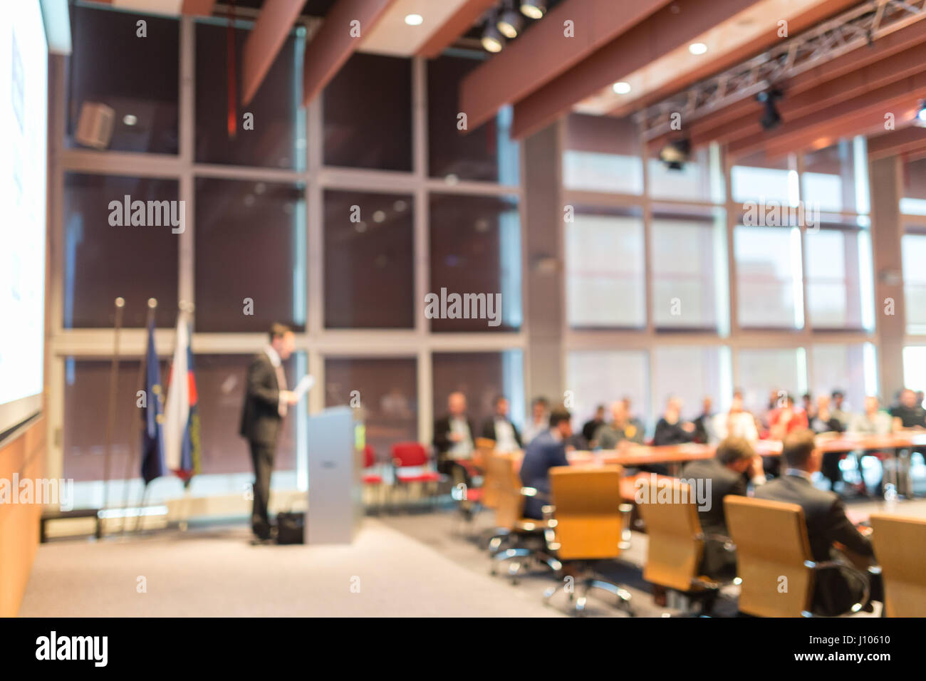 Public speaker giving talk at Business Event. Stock Photo