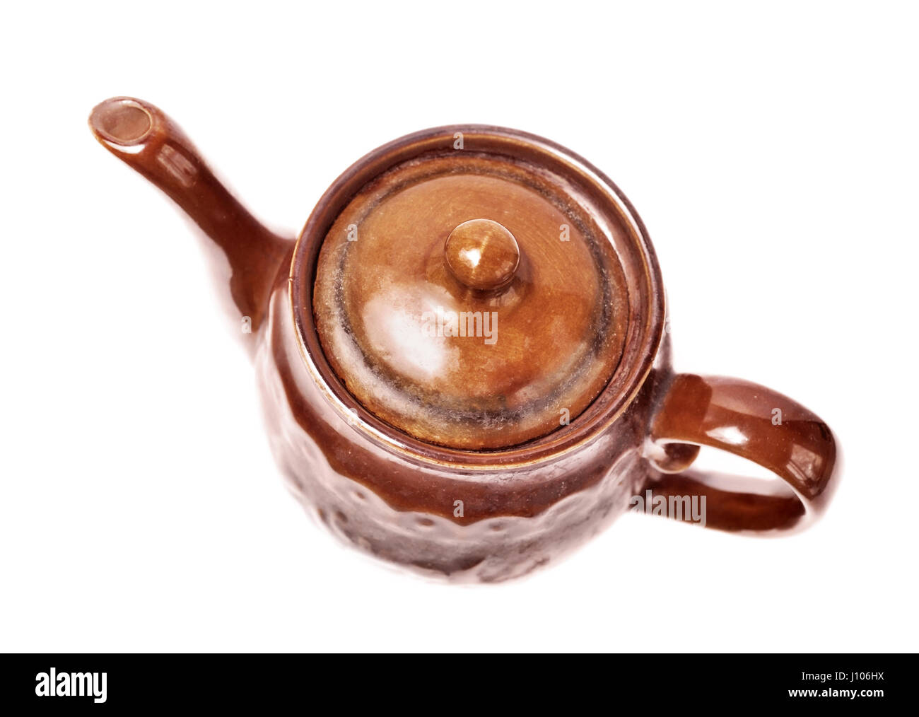 Vintage old brown teapot isolated Stock Photo Alamy