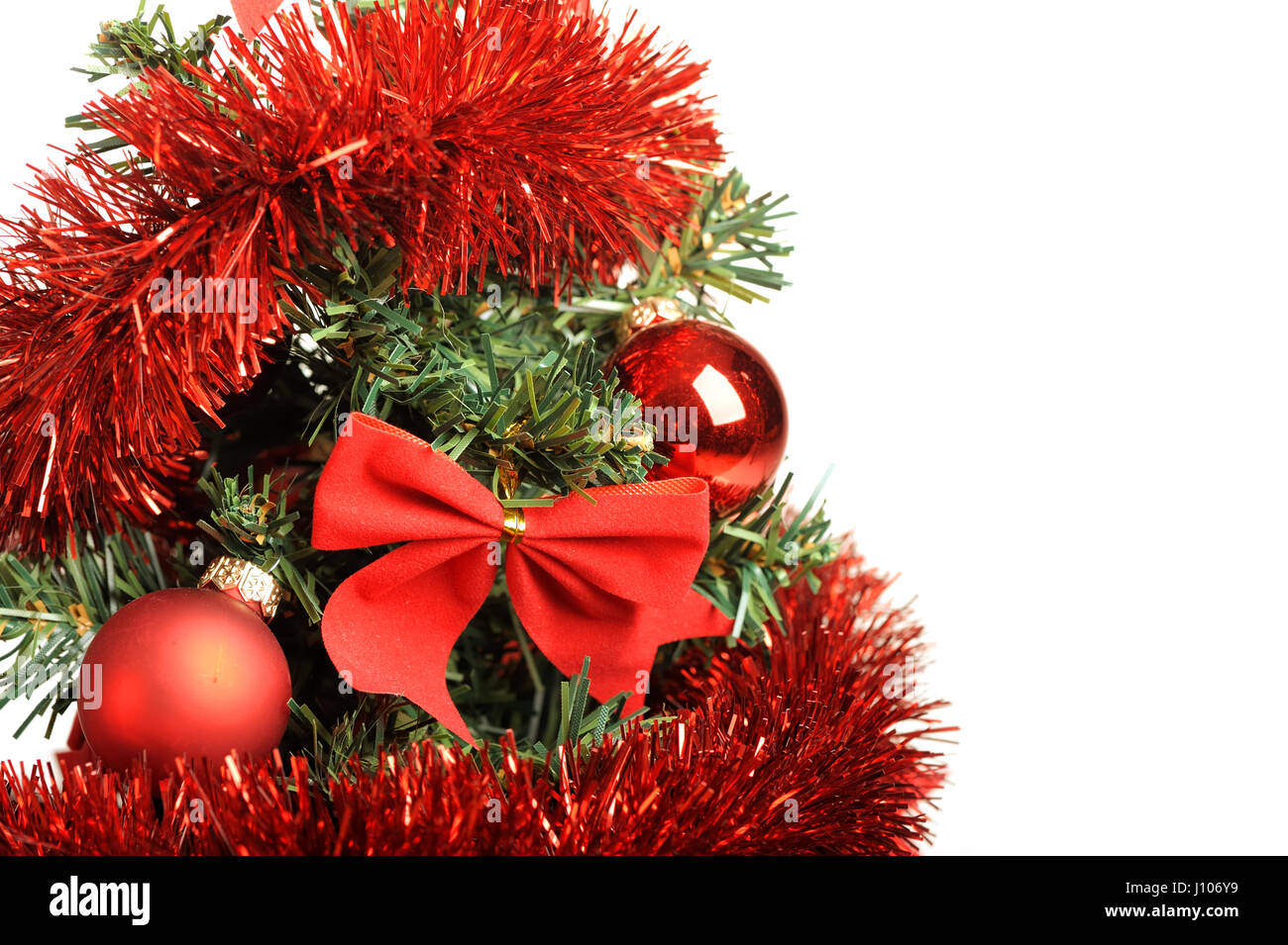 Decorated Christmas tree isolated on white background Stock Photo - Alamy