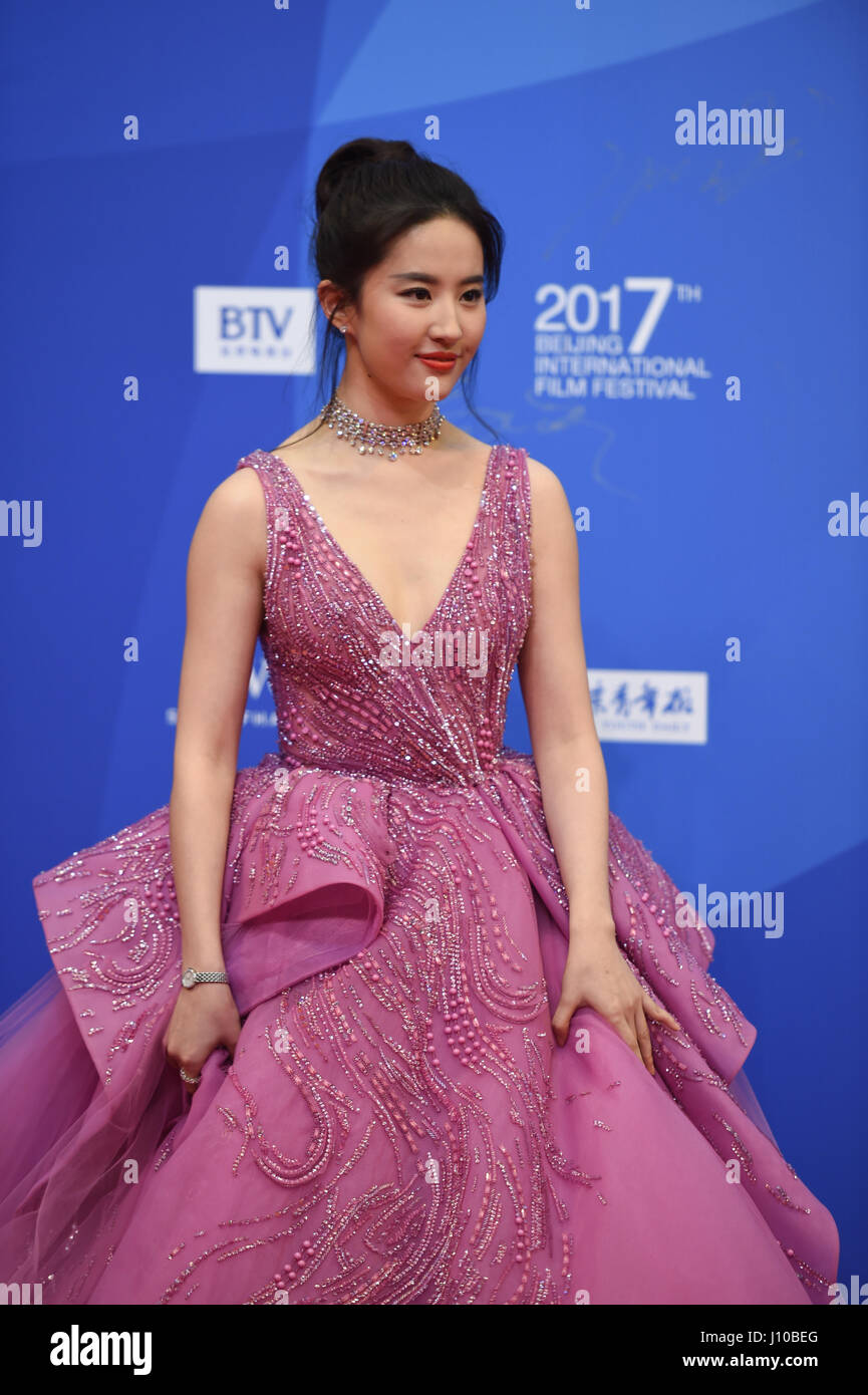 Beijing, China. 16th Apr, 2017. Actress Liu Yifei poses on the red carpet during the opening ceremony of the 7th Beijing International Film Festival (BJIFF) in Beijing, capital of China, April 16, 2017. Credit: Ju Huanzong/Xinhua/Alamy Live News Stock Photo