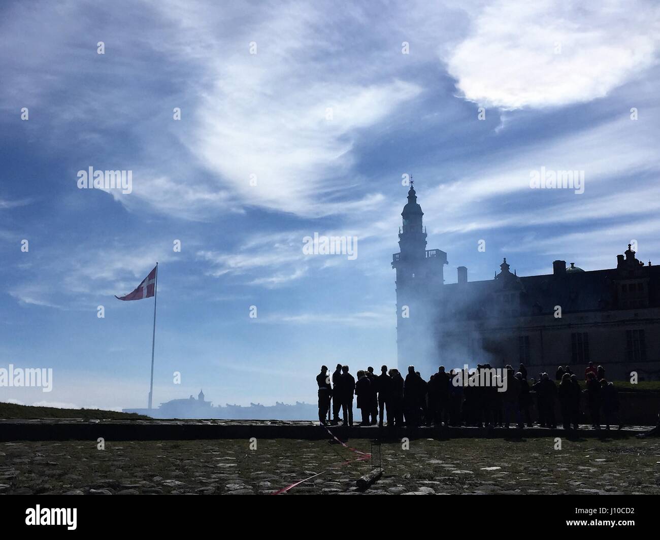 Elsinore, Denmark. 16th Apr, 2017. Cannons are fired with 27 shots as a salute to the Queen Margrethe II of Denmark, at Kronborg Castle in Elsinore, Denmark, April 16, 2017. Queen Margrethe II of Denmark celebrated her 77th birthday on Sunday. Credit: Shi Shouhe/Xinhua/Alamy Live News Stock Photo