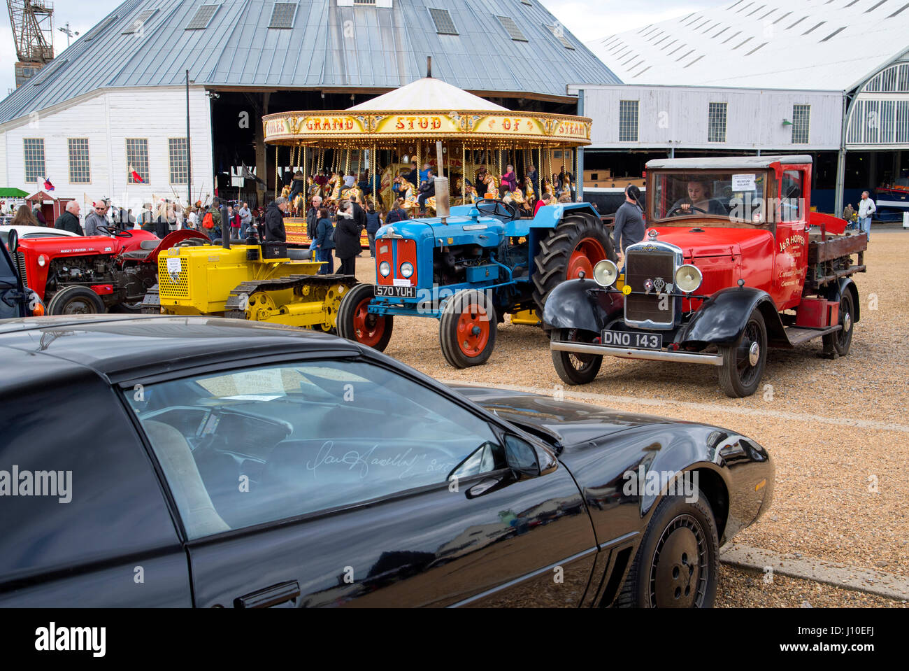 Chatham, Kent, UK. 16 April 2017. Hundreds of families came to see classic and vintage cars, trucks, steam engines and commerical vehicles and to ride vintage fairground attractions gathered at Chatham Historic Dockyard in Kent for the festival of Transport over the Easter weekend. Credit: Matthew Richardson/Alamy Live News Stock Photo