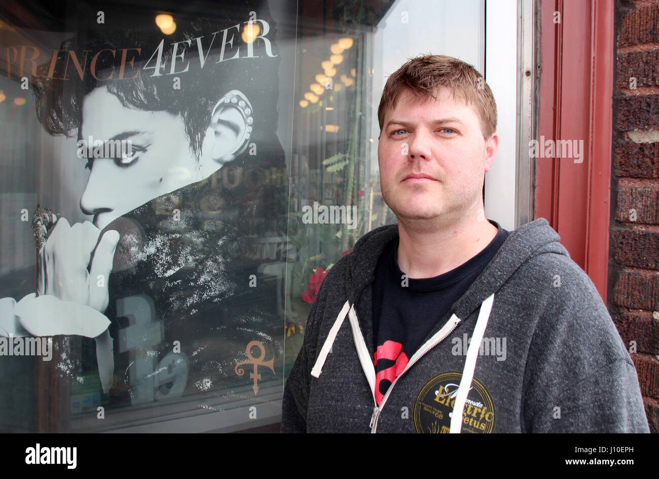 Minneapolis, Minnesota, USA. 13th Apr, 2017. Aaron Meyerring, owner of the 'Electric Fetus' record store, stands outside of his shop in Minneapolis, Minnesota, USA, 13 April 2017. On April 21st, 2016 died the american pop-star at his estate in Chanhassen, Minnesota, of an accidental overdose of the analgesic Fentanyl. Photo: Christina Horsten/dpa/Alamy Live News Stock Photo