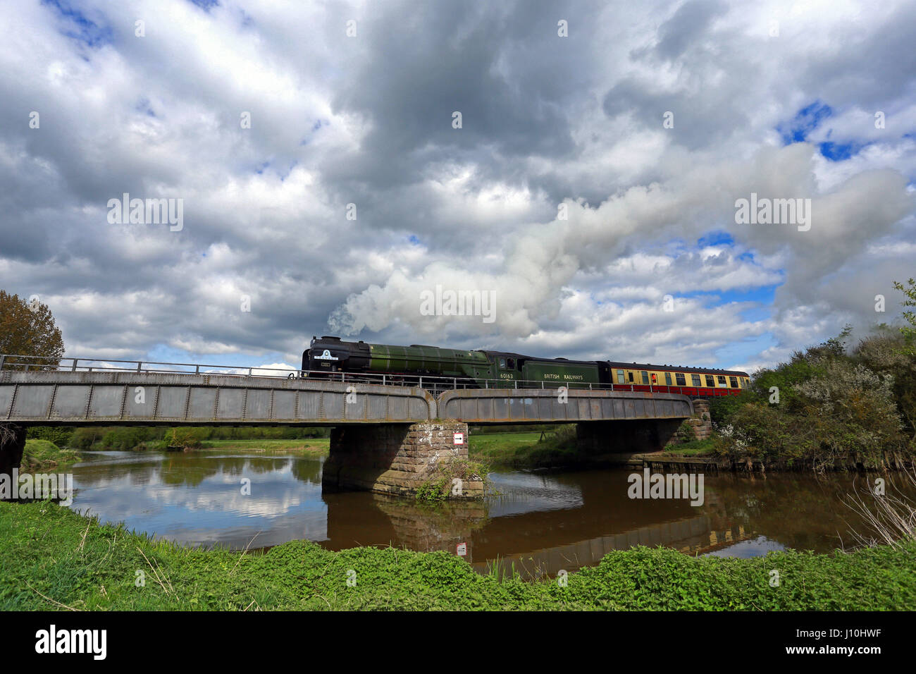 Tornado Steam train . Peterborough, UK. 17th Apr, 2017. The Tornado steam locomotive 60163 makes its way over the River Nene on the way to Nene Valley Railway in Wansford, Cambridgeshire. The Tornado is making a special appearance this coming weekend, after recently travelling at 100mph on the East Coast mainline. Credit: Paul Marriott/Alamy Live News Stock Photo