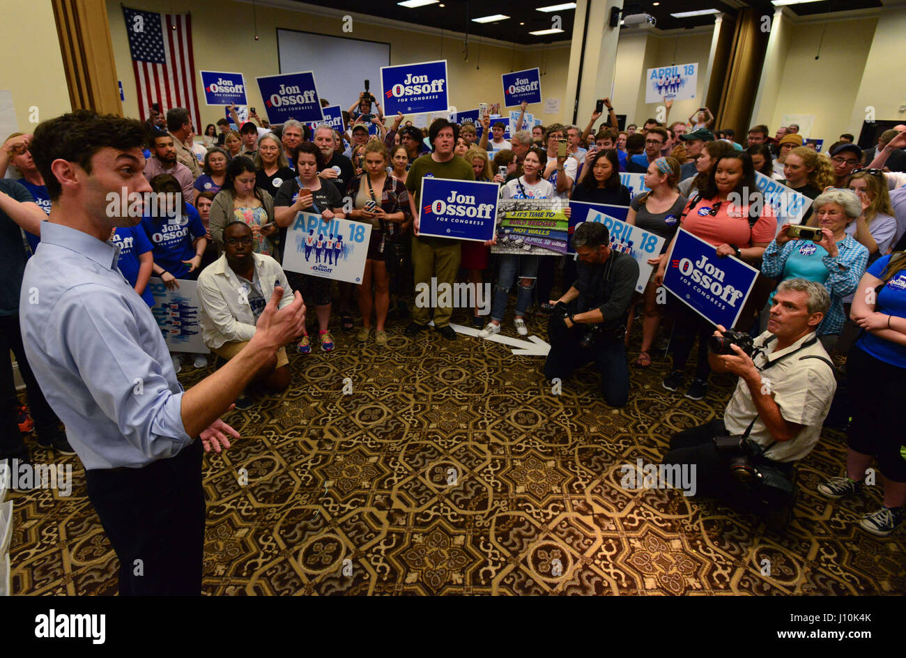 Atlanta, Georgia, USA. 17th Apr, 2017. Georgia Democrat Jon Ossoff-- hoping to pull off a historic upset in a special congressional election Tuesday--speaks Monday during a closing campaign rally in Roswell, a northern Atlanta suburb. Ossoff is leading a huge field of candidates, riding a wave of grass roots activism fueled by anti-Trump sentiment in the lead up to Tuesday's vote, when he could become the first Democrat to win the district in decades. Credit: Miguel Juarez Lugo/ZUMA Wire/Alamy Live News Stock Photo