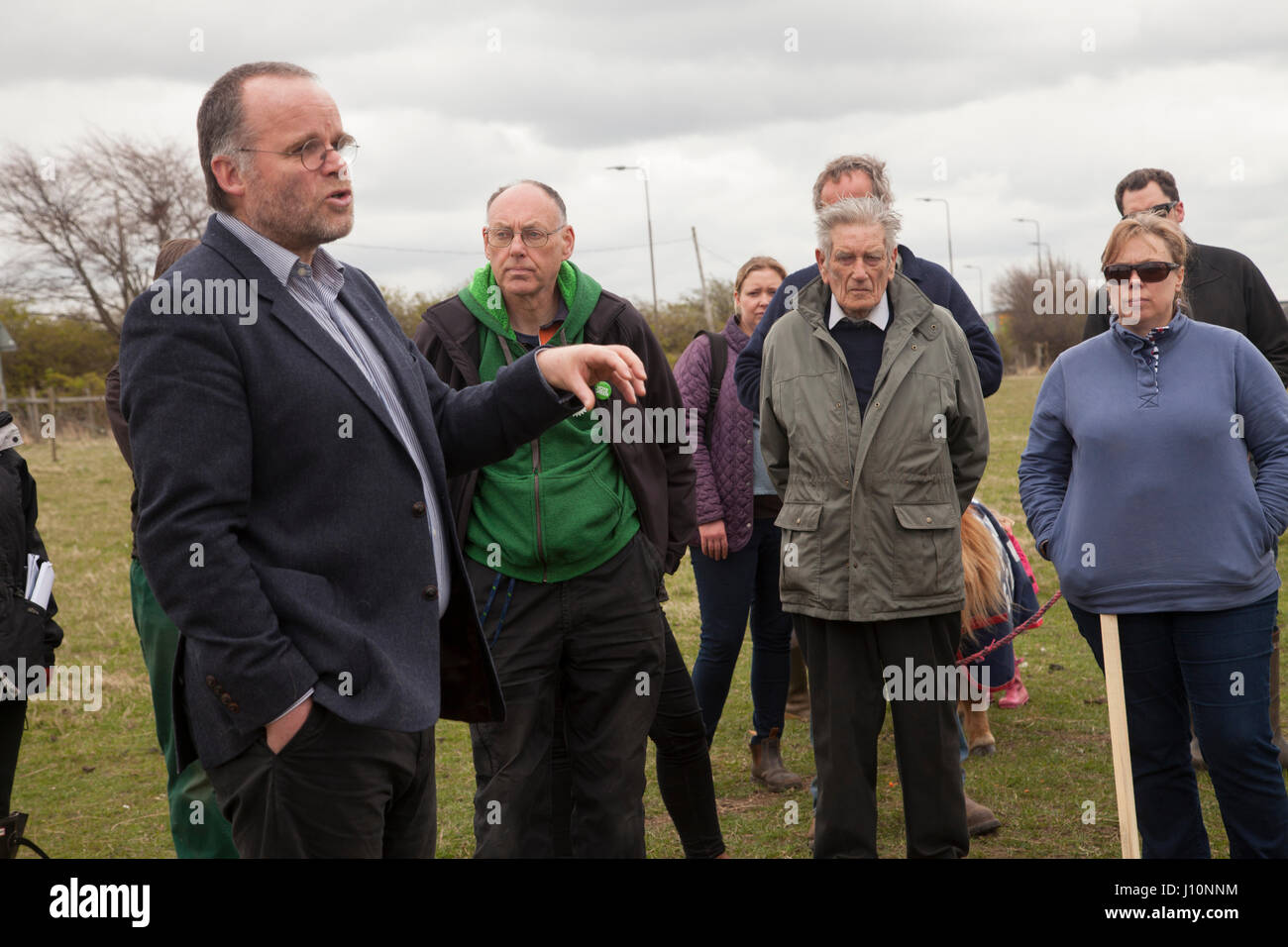 Damhead, Scotland, UK. 17th Apr, 2017. Save Jim´s farm: Object to the development of Pentland Studios on agricultural land. Around 100 people from across the Lothians, Borthers and Fife gathered on Easter Monday to save their local farm from development. Credit: Gabriela Antosova/Alamy Live News Stock Photo
