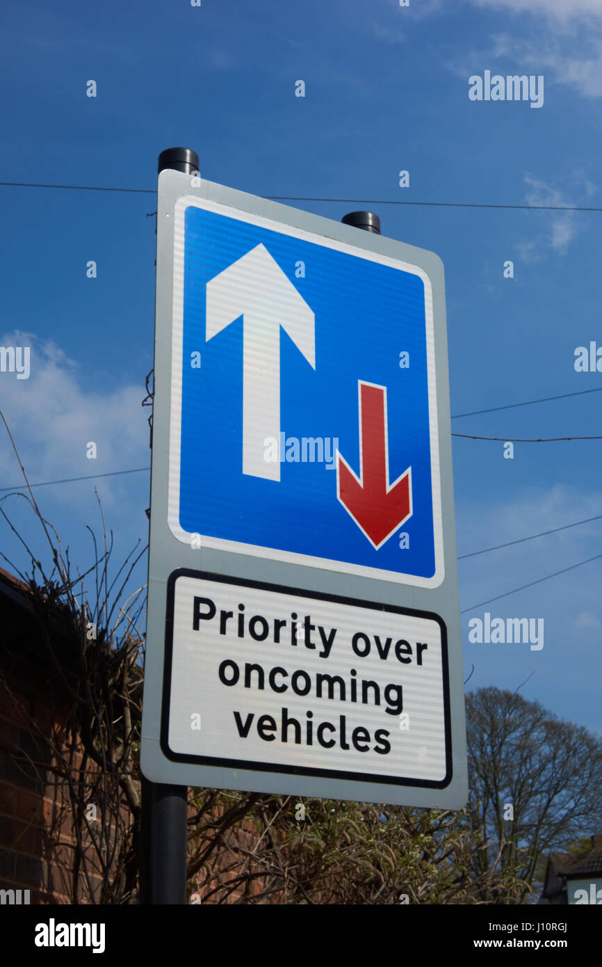 priority over oncoming traffic sign. UK Stock Photo