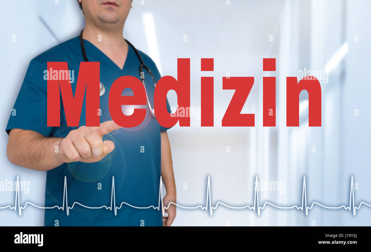 Medizin (in german Medical) doctor showing on viewer with heart rate concept. Stock Photo