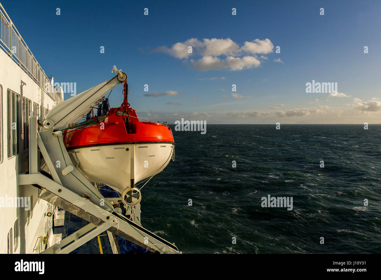 Lifeboat on the Ro/Ro Stena Line ferry M/V Oscar Wilde with copy space. Stock Photo