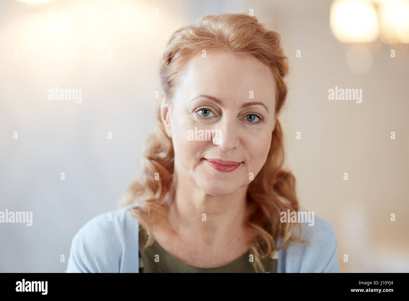 Happy mature woman wavy hi-res stock photography and images - Alamy